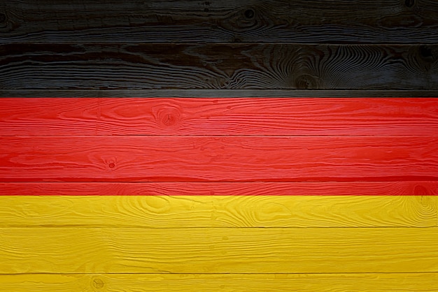 Germany flag painted on old wood plank background