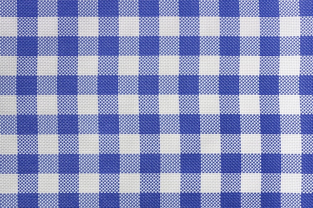 Geruit tafelkleed voor de tafel in blauwe en witte cellen Achtergrondtextuur van textielservet