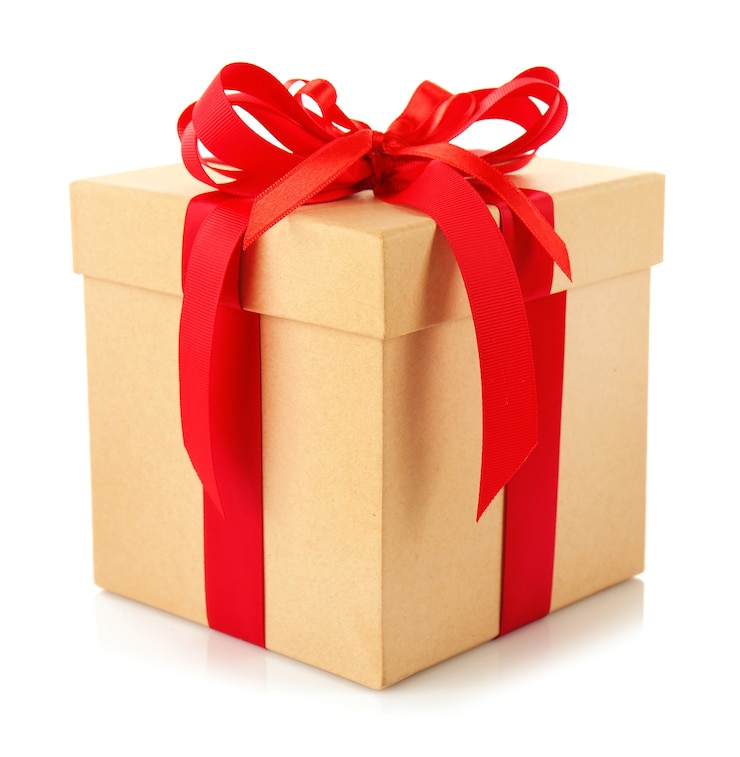 Foto geschenkdoos met rode strik geïsoleerd op een witte achtergrond