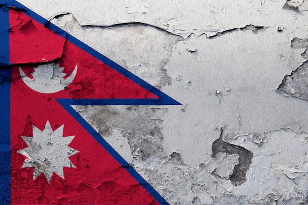 Geschilderde nationale vlag van Nepal op een betonnen muur