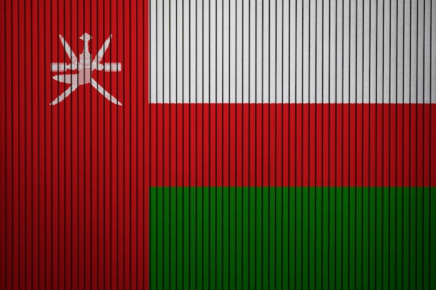 Geschilderde nationale vlag van Oman op een betonnen muur