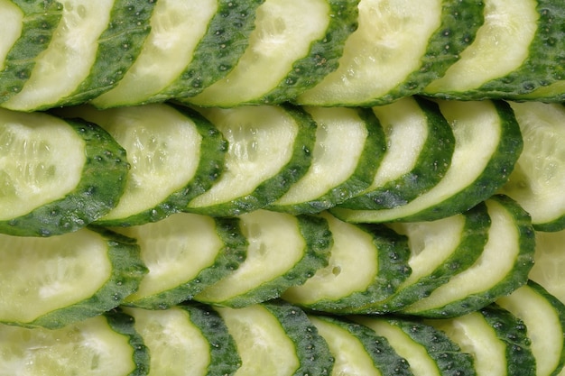 Foto gesneden komkommers nuttig als achtergrond.