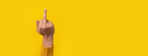 Gesture, rude sign, woman hand with middle finger up