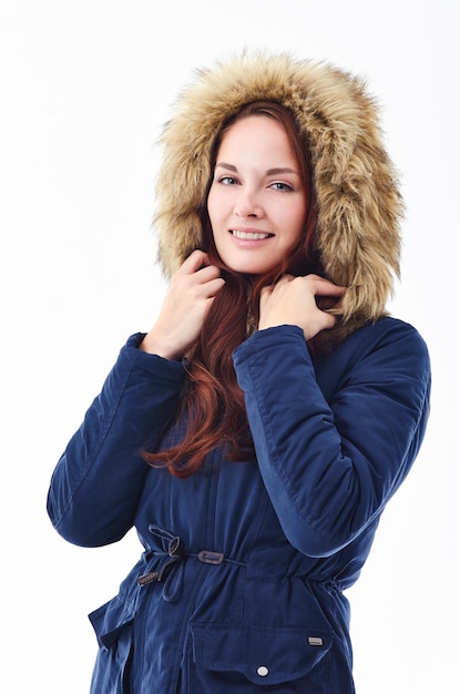 Get out your winter gear Studio portrait of a young wearing a winter jacket against a white background