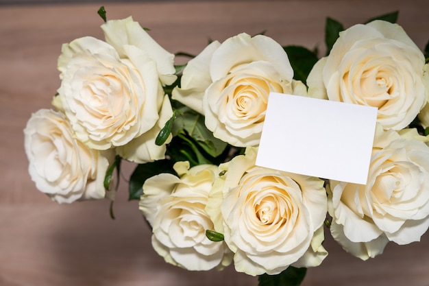 Gettig frame mock up card o white roses. Empty copyspace for text. High quality photo