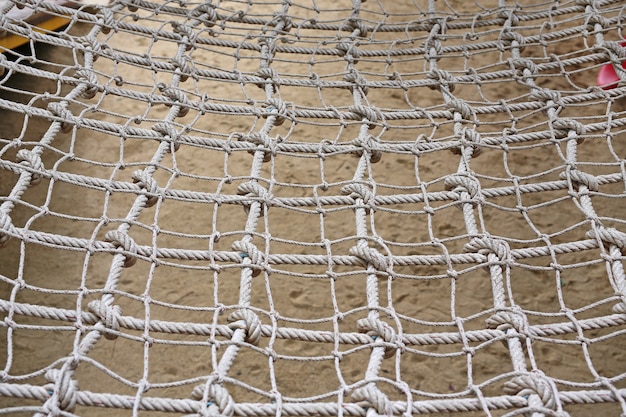Geweven Klim netkabeltextuur op speelplaats.