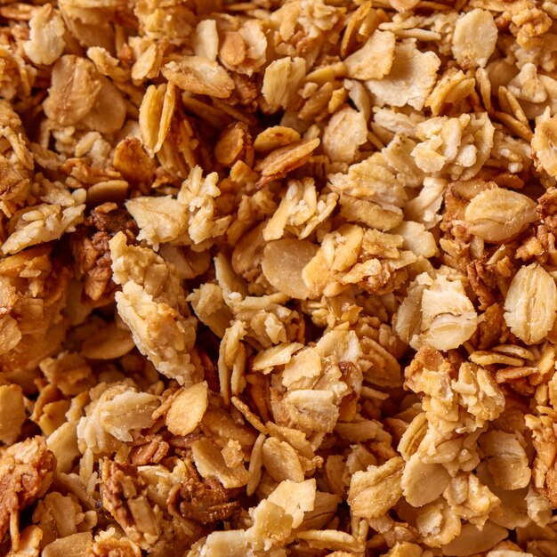 Gezonde natuurlijke achtergrond met havergranola voor dieet vegetarisch eten. Plaats onder tekst. Bovenaanzicht.