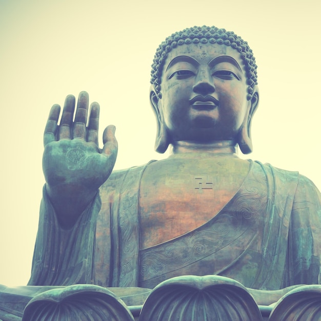 Giant buddha in hong kong. retro style filtred image