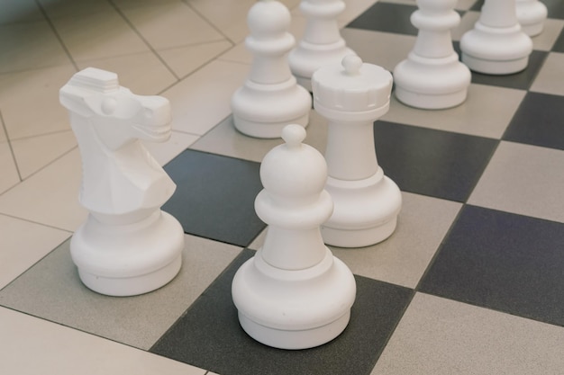 Giant chess on the board located on the ground floor