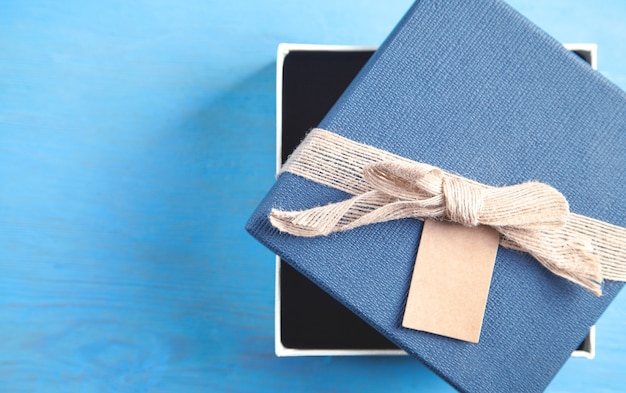 Gift box on the blue background.