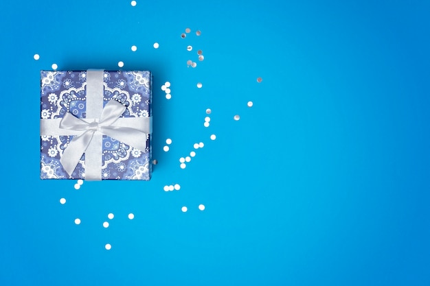 Gift box on a blue festive