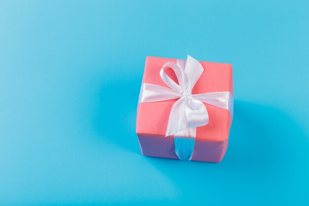 Gift box on blue