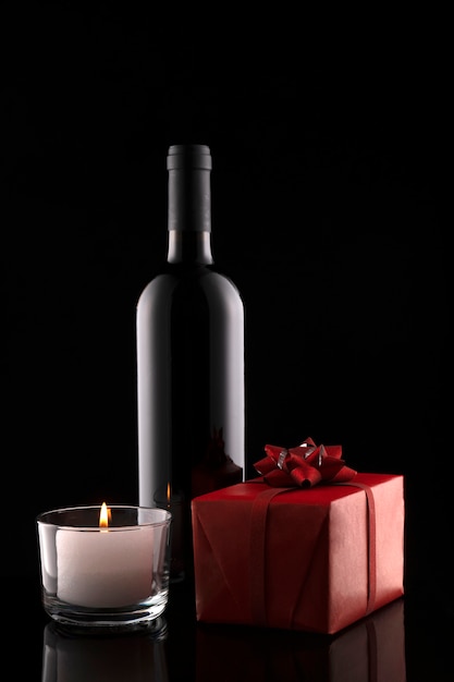 Gift box, bottle of wine, candle Valentine's day. Wedding day. Romantic greeting card and invitation.