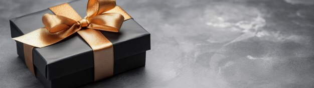 Foto scatola regalo e arco su sfondo neutro