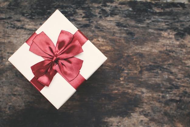 Gift box on brown wood