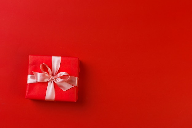 Gift box on color background