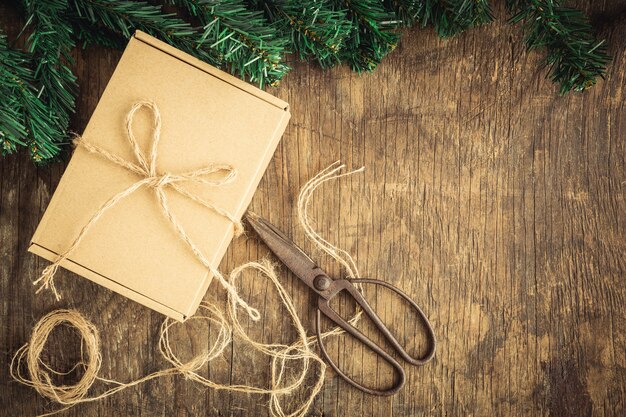 Gift box on old wooden background,Christmas concept