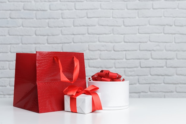 Gift box in paper shopping bag