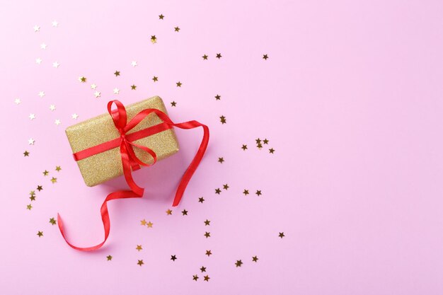 Gift box on pink background