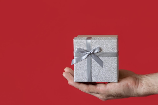 Gift box on a red background copy space holidays and events\
gift shop