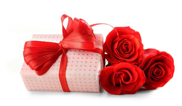 Gift box rose flowers and decorative heart isolated on white