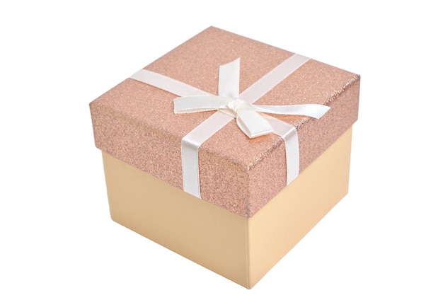 Gift box white background is tied with beige ribbon with bow