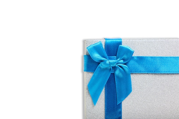 Gift box white background is tied with blue ribbon with bow