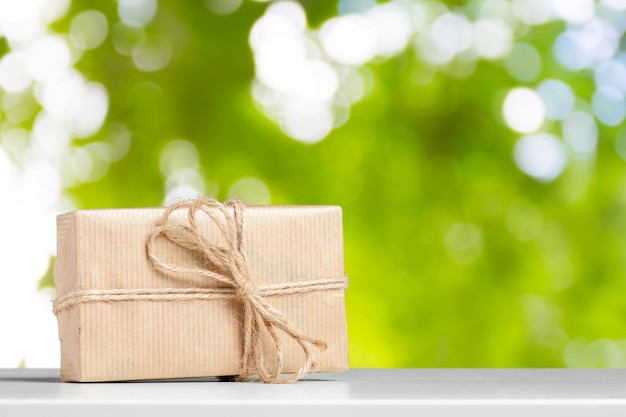 Gift box on white table