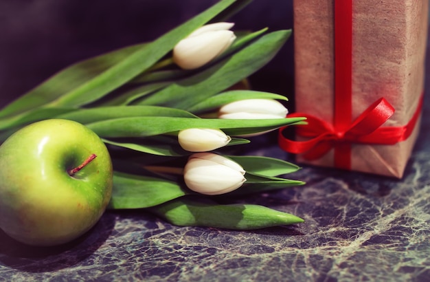 Gift box and white tulips