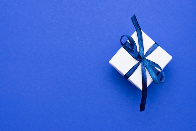 Gift box with classic blue bow