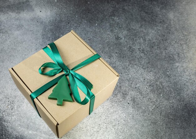 Gift box with green ribbon