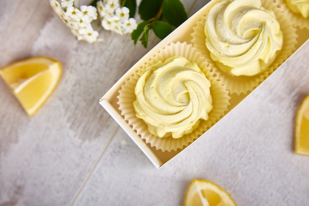 Gift box with homemade lemon yellow color marshmallows.