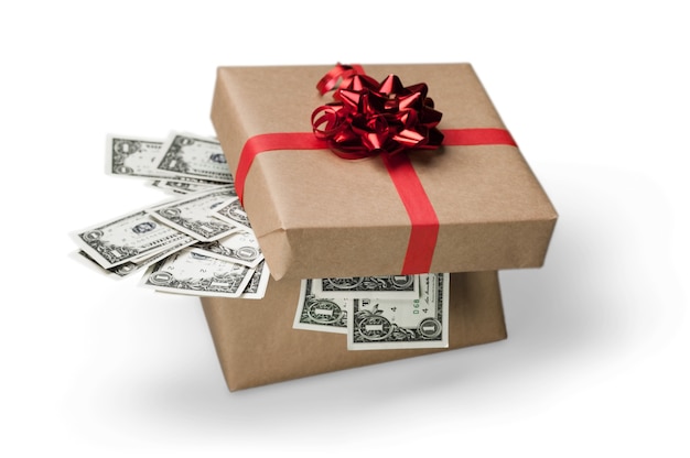 Gift box with money on white background