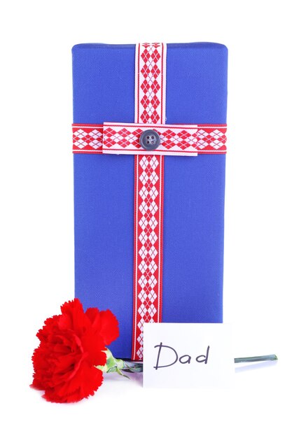 Photo gift box with red carnation and card for dad isolated on white background