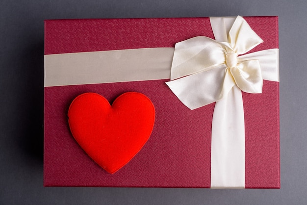 Gift Box With Red Heart on Gray