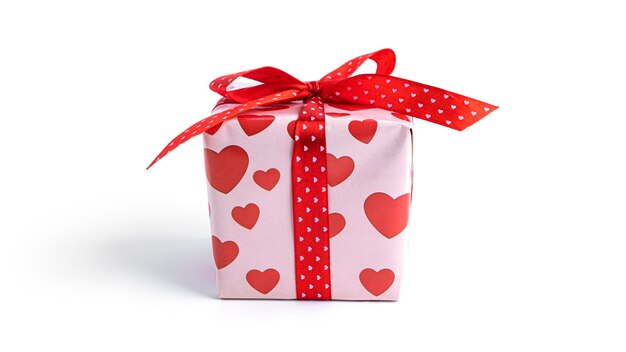 Gift box with red ribbon and hearts isolated on white surface
