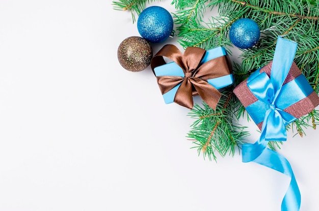 Gift box with ribbon in blue and brown