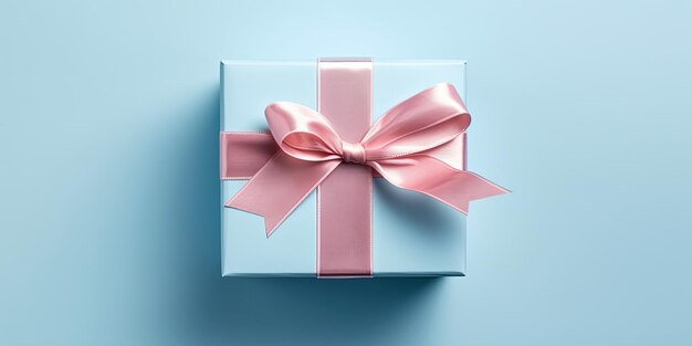 파란색 바탕 에 사틴 리본 과 활 이 있는 선물 상자