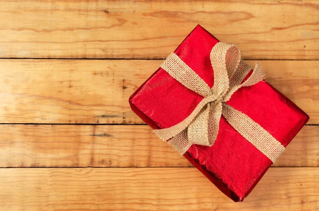 gift box on wooden table Top view