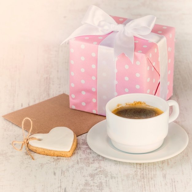 Gift box wrapped in pink paper. 