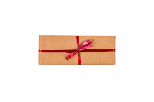 Gift Boxes in Craft Wrapping Paper with Red Ribbons isolated