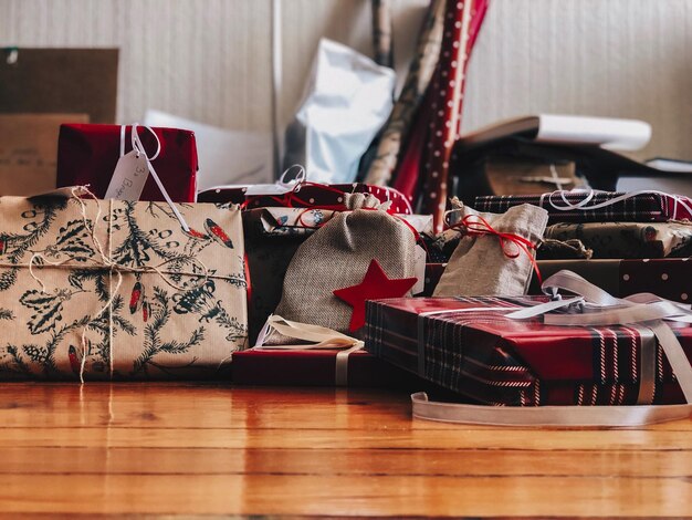 Photo gift boxes on hardwood floor at home