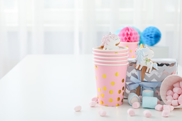 Photo gift boxes marshmallows and paper cups on white background space for text
