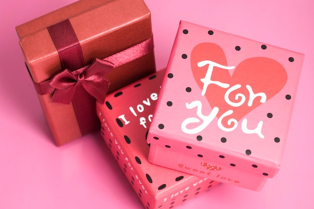 Gift boxes on pink background