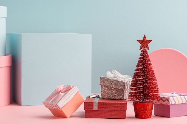 Gift boxes and red Christmas tree