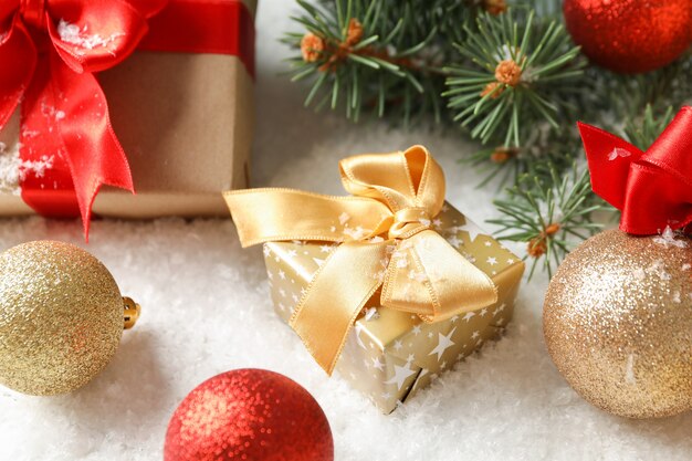 Gift boxes with bow on decorated table, close up