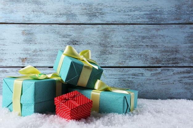 Gift boxes on wooden background