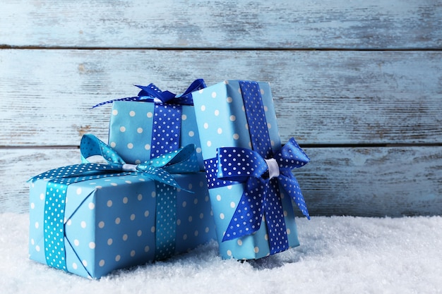 Gift boxes on wooden background