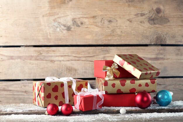 Gift boxes on wooden background