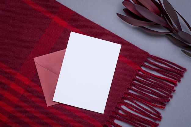 Gift card and burgundy wrap on gray